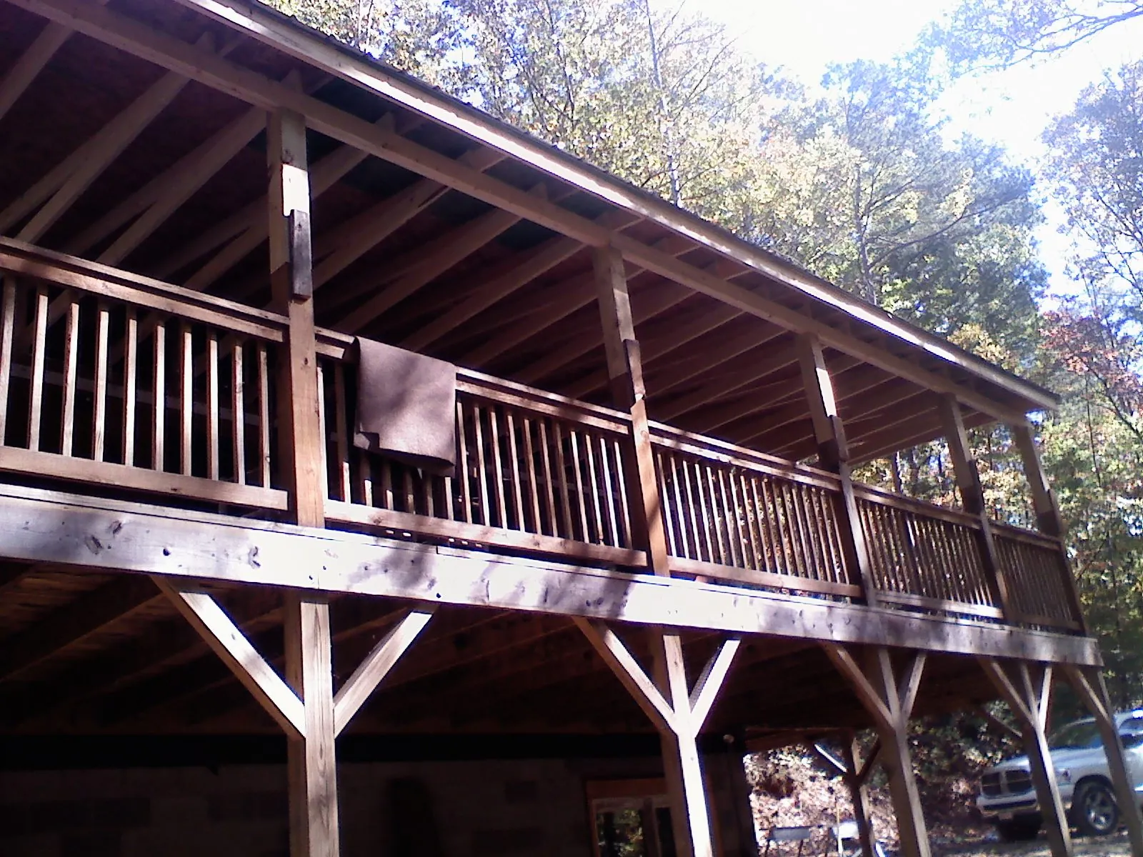 Timber framing under a new elevated porch and deck — Roof Leak Repair in Nampa by Roofing Brothers